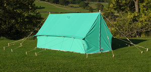 Scouting tent set up in a field